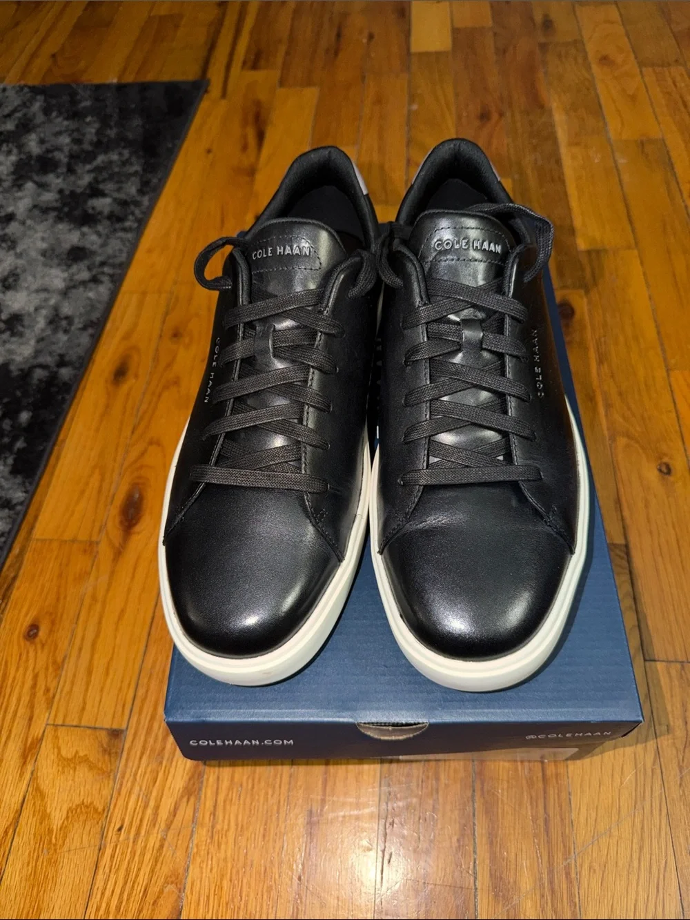 Cole Haan Black Leather Sneakers with White Sole